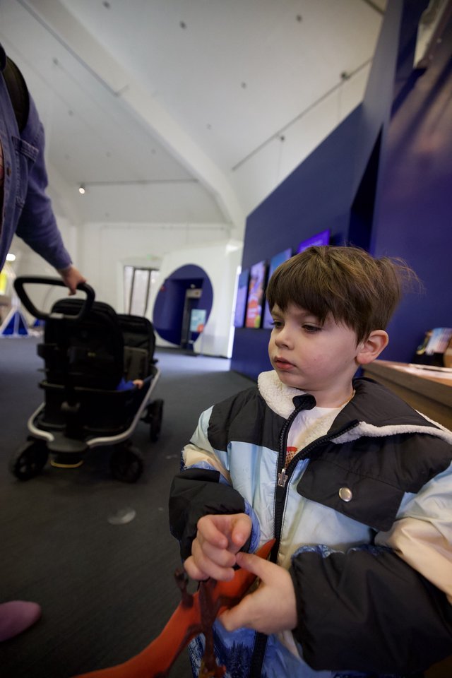 Young Boy Exploring Modern Museum Gallery Space