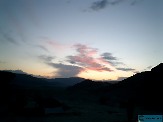 Serene Sunset over Mountain Range