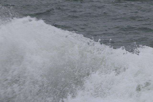 Churning Ocean Wake Crashes in Dramatic Foam