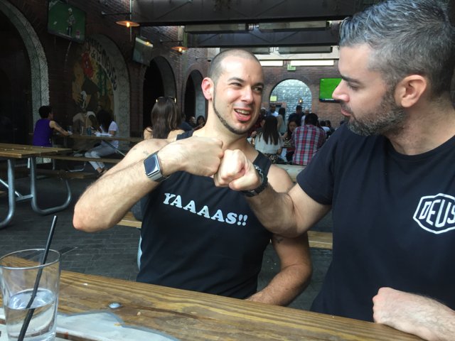 Two Men Enjoying a Drink at a Local Pub
