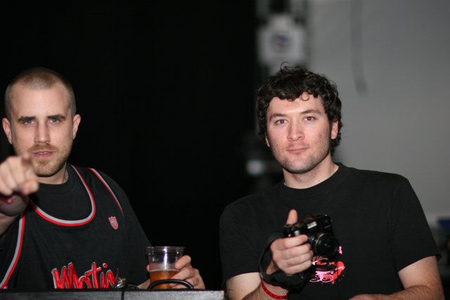 Two Men Enjoying Beers Together