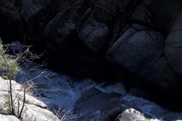 Winter Rapids Through Granite Canyon Shadows