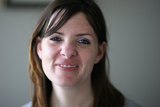 Warm Natural Portrait of Smiling Young Woman