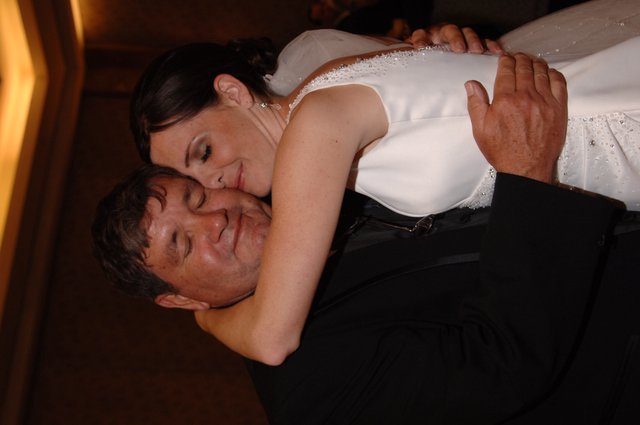 Father-Daughter Dance Embrace at Wedding Reception