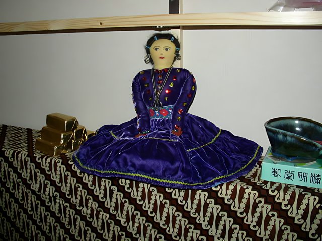 Doll in a Purple Velvet Dress on a Japanese Shelf