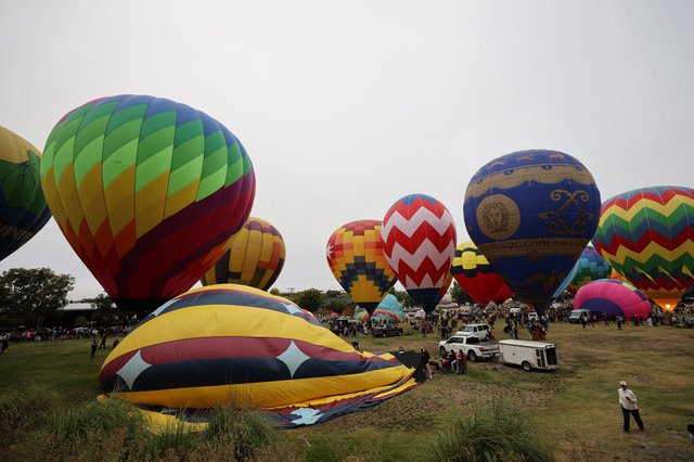 Colorful Hot Air Balloons Fill the Festival Grounds