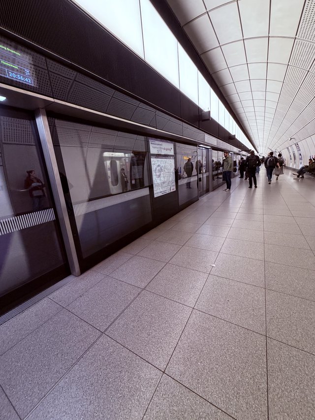 Modern London Underground Platform at Rush Hour