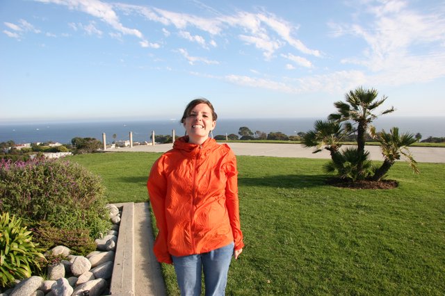 Woman Enjoying Coastal View at Scenic Overlook