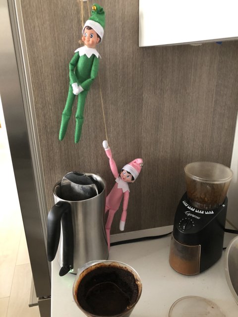 Two Elf Dolls Enjoying their Coffee