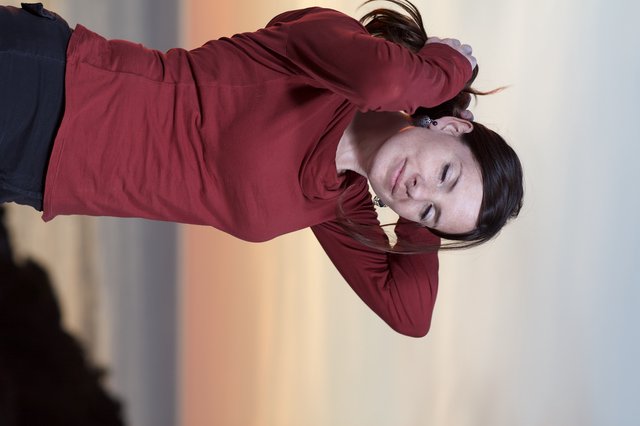 Windswept Woman at Golden Hour by the Sea