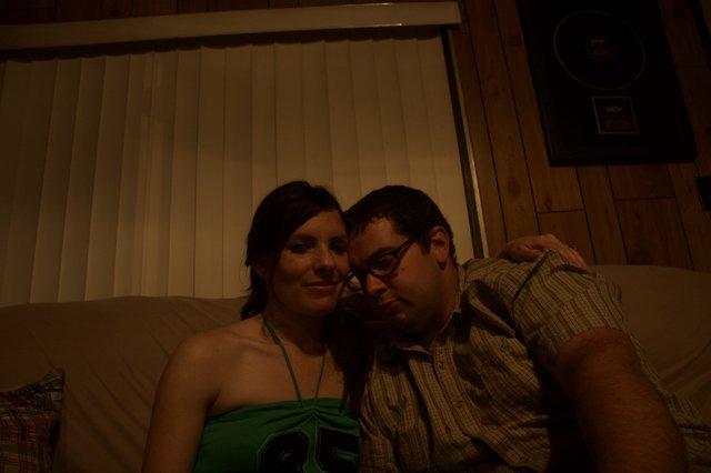 Couple Relaxing Together on Couch at Night