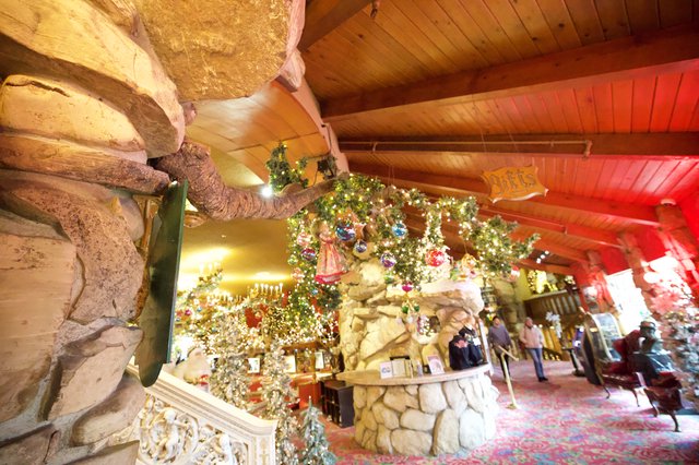 Festive Christmas Wonderland Inside Rustic Log Cabin Store