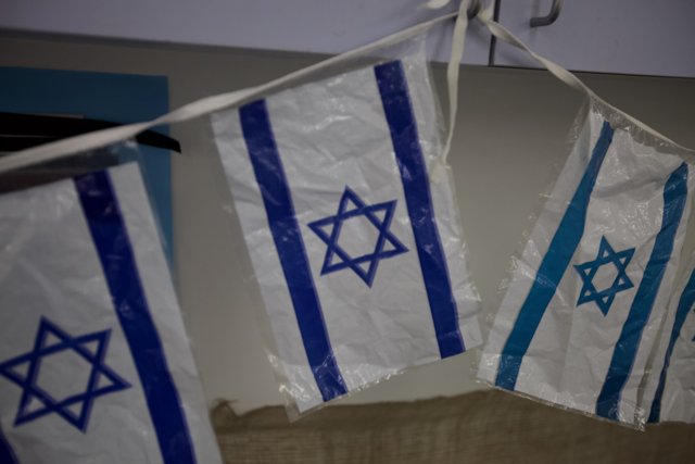 A Window Display of Israeli Flags
