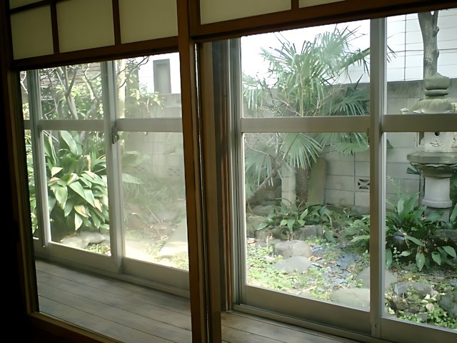 Picture Window: A Serene View of a Japanese Garden