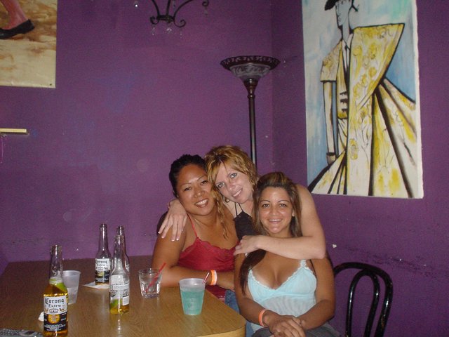 Three Friends Enjoying a Night Out at the Bar