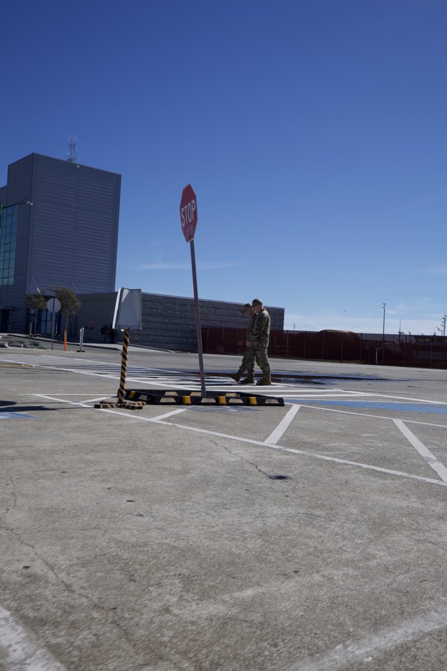 Military Personnel at USS Hornet Parking Lot