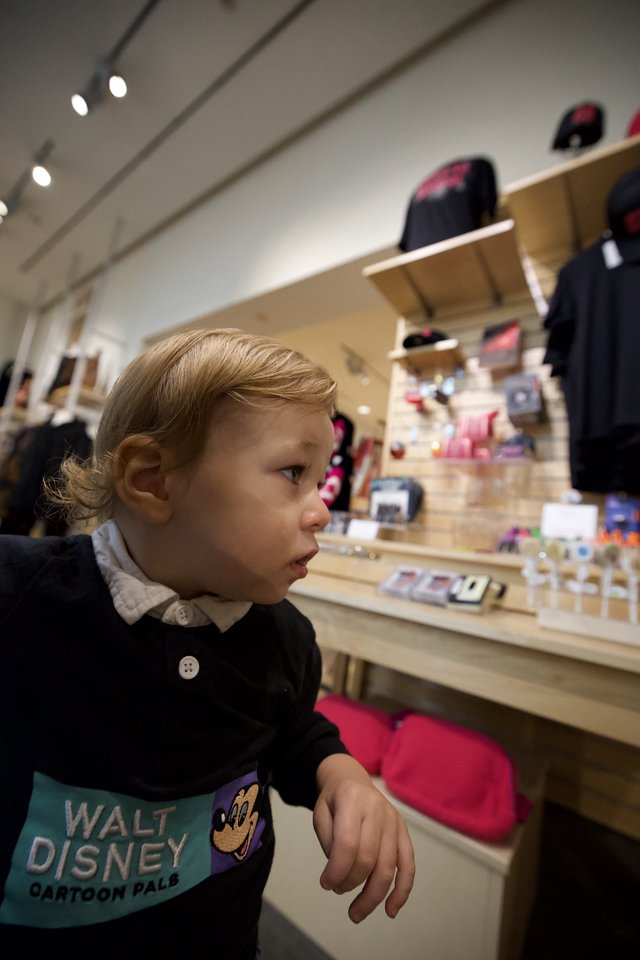 Toddler Exploring Retail Display at Asian Art Museum