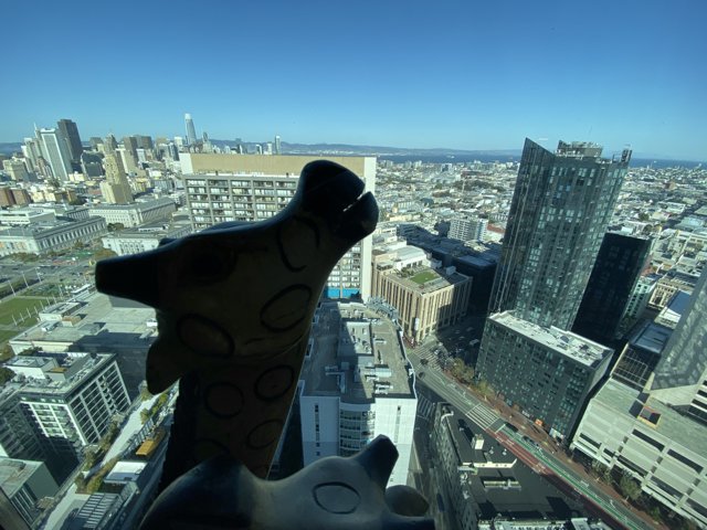Giraffe Overlooking San Francisco Cityscape