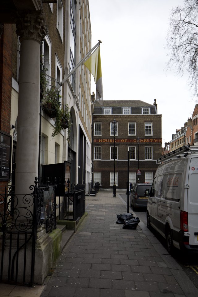Narrow London Alley Leading to Historic House of Charity