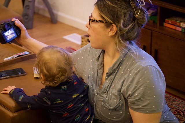 Mother and Child Capturing Christmas Morning Moments
