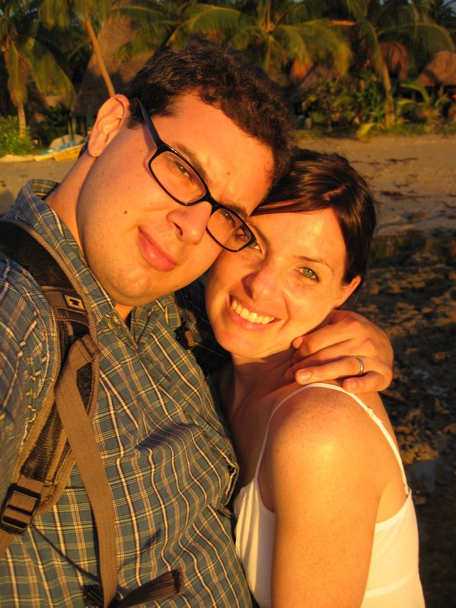Couple's Golden Hour Embrace on Fiji Beach