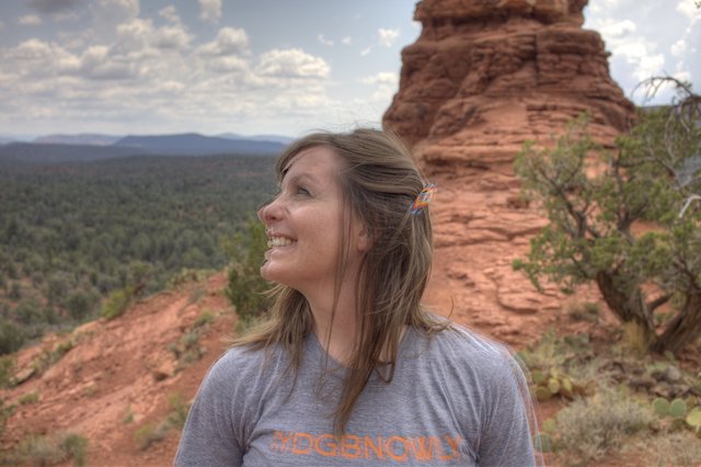 Smiling Woman Gazing at Sedona Red Rock Vista