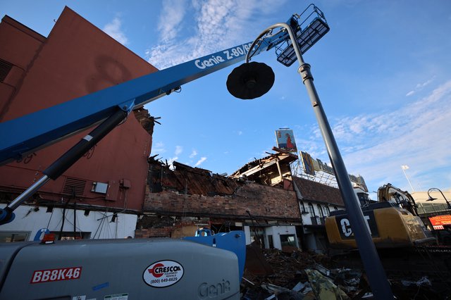 Demolition Site with Genie Crane at Dusk