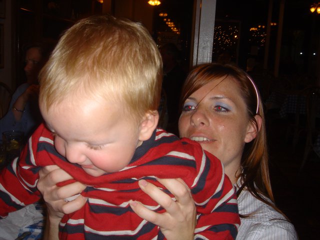 Mother and Toddler Share a Playful Indoor Moment