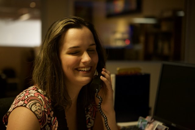 Smiling Woman on the Phone - APC Office 2008
