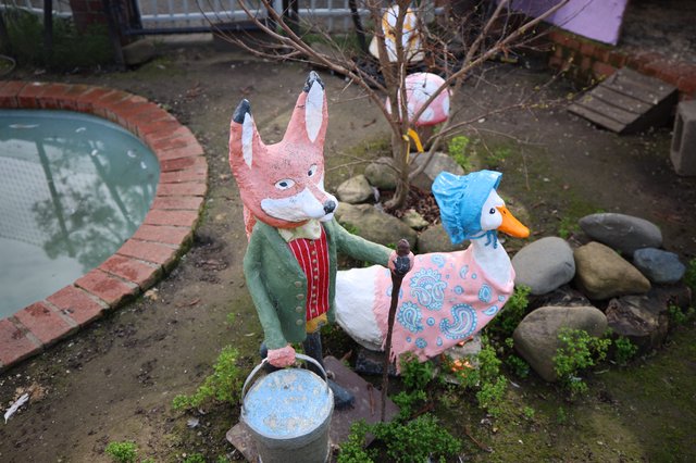 Whimsical Fox and Duck Garden Sculptures in Fantasyland