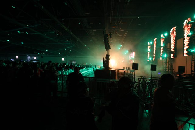 Neon Green Haze Over Wobbleland Festival Crowd