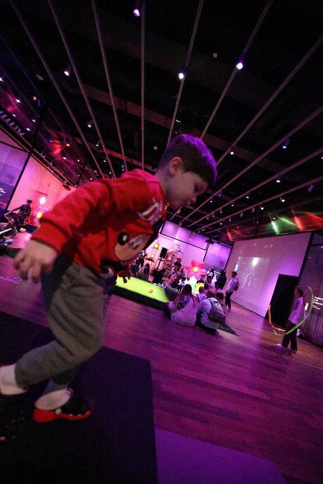 Child Dancing at Baby Rave Event