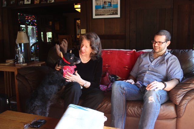 Cozy living room with Rhoda and Dave B and their furry friend