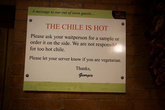 Restaurant Warning Sign About Spicy Chile for Guests