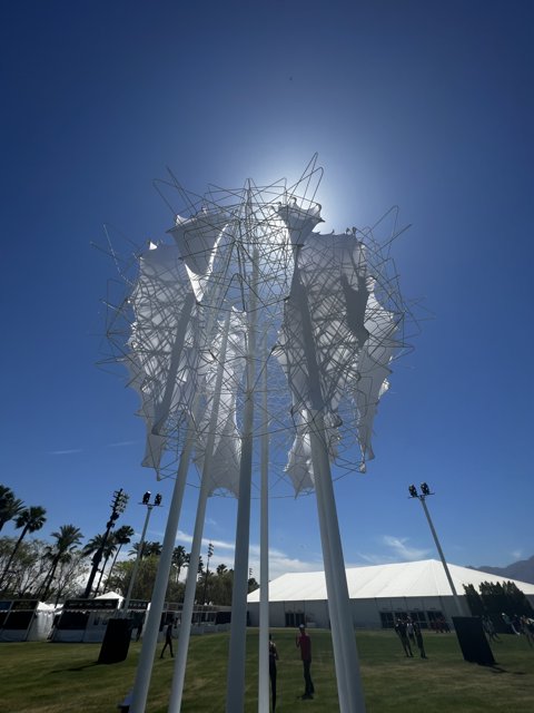 White Fabric sculpture shines under the blue sky