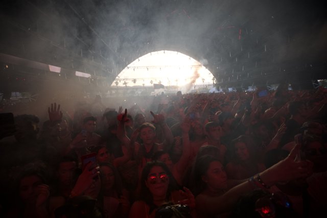 Concert Crowd Enveloped in Smoke