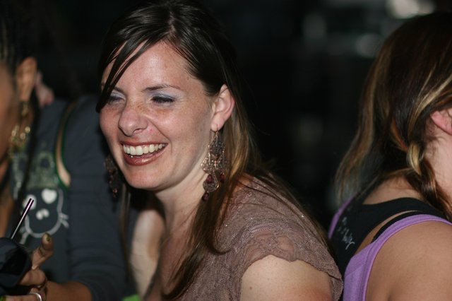 Joyful Woman Laughing at Nightclub Event 2006