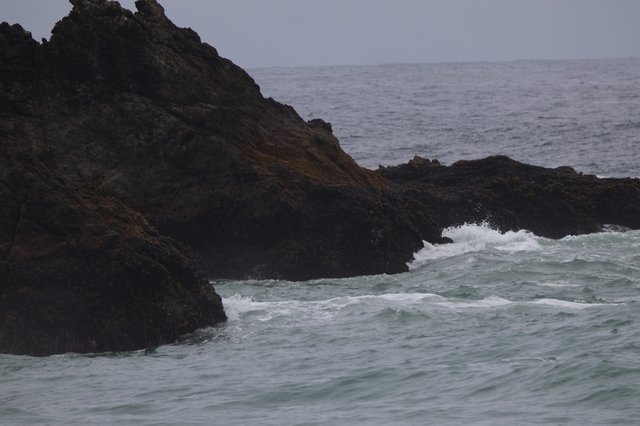 Dark Coastal Rocks Battered by Atlantic Swells