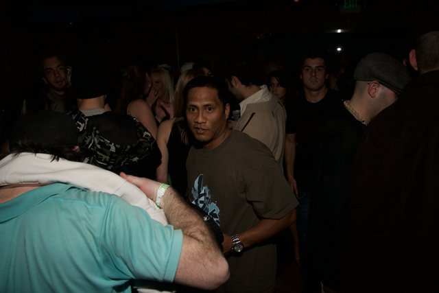 Blue Shirt in a Nightclub Crowd