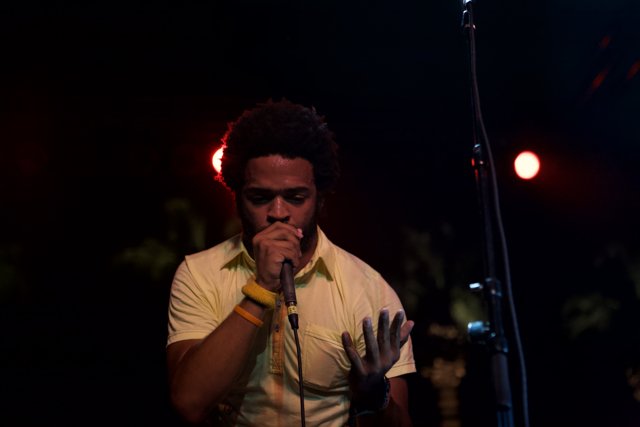 Yellow-Shirted Singer on Stage