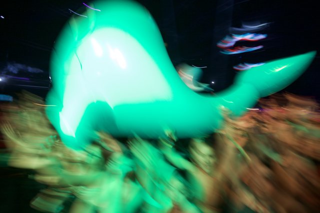 Illuminated Whale at a Night Club