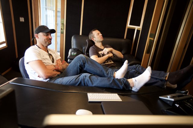 Two Men Take a Break in the Recording Studio
