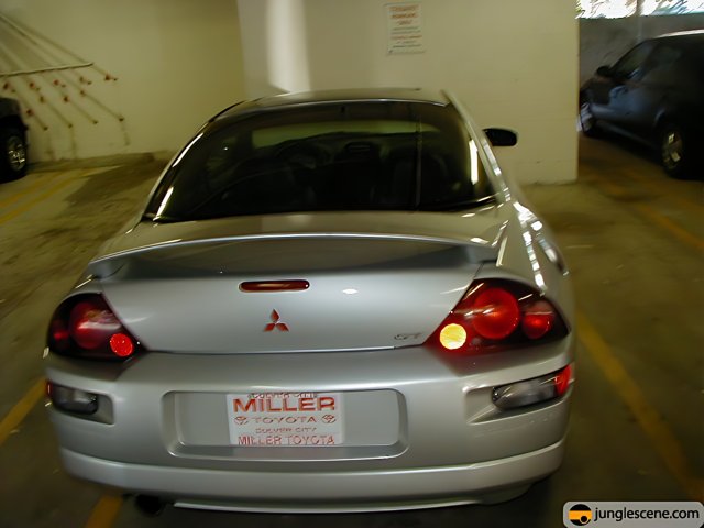Silver Sports Car in Parking Garage