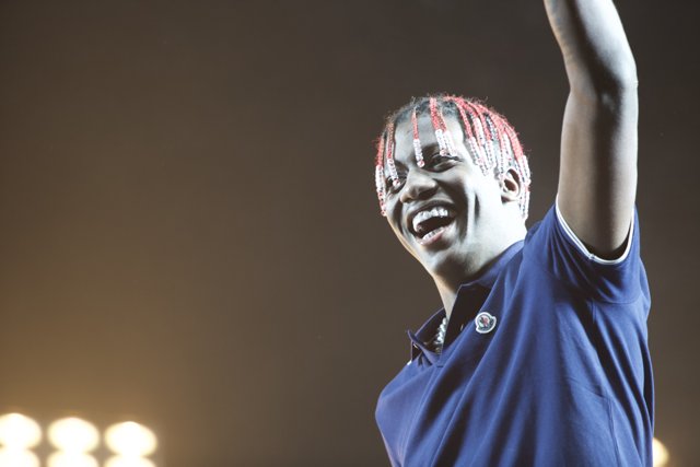 Lil Yachty Triumphantly Smiling on Stage