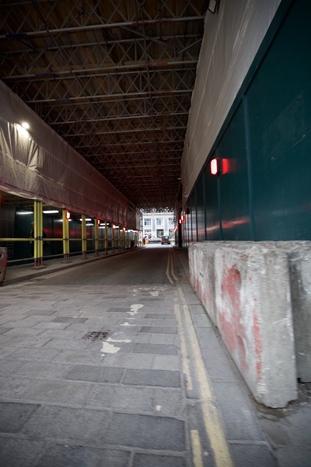 Industrial Loading Bay with Covered Platforms at Night