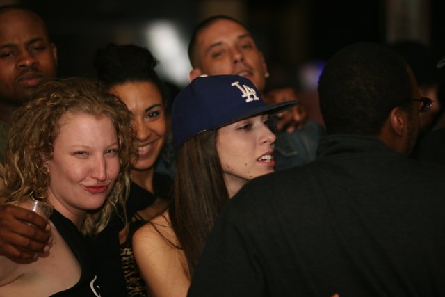 Blue-Hatted Lady at a Party