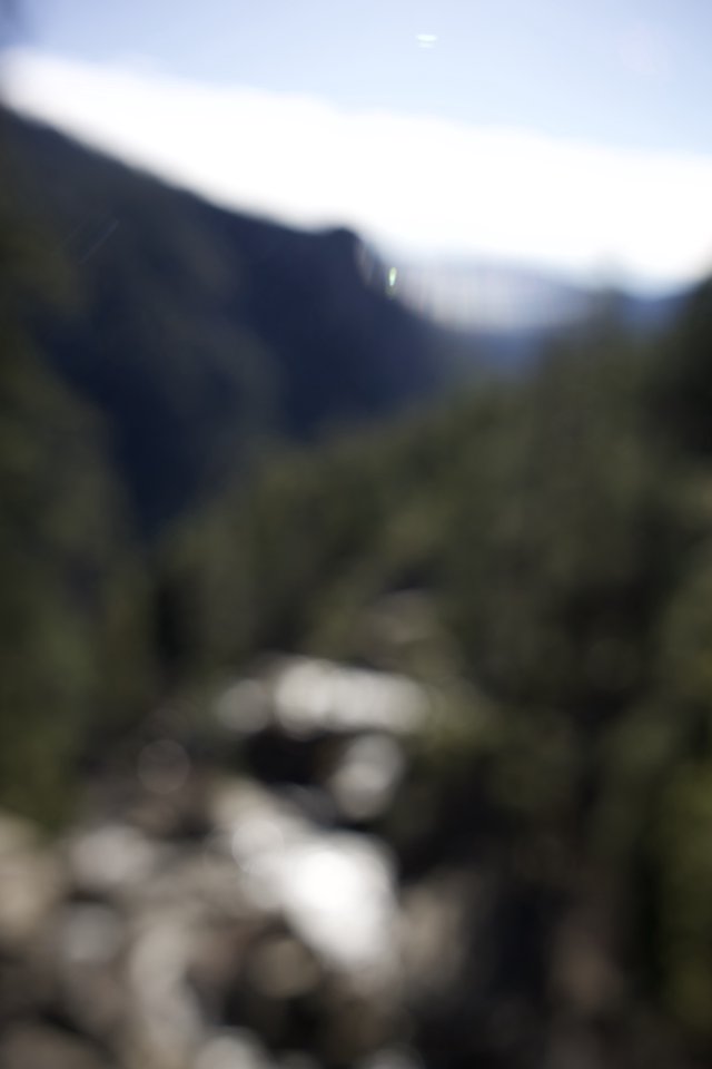 Mountain Stream Through Misty Highland Valley