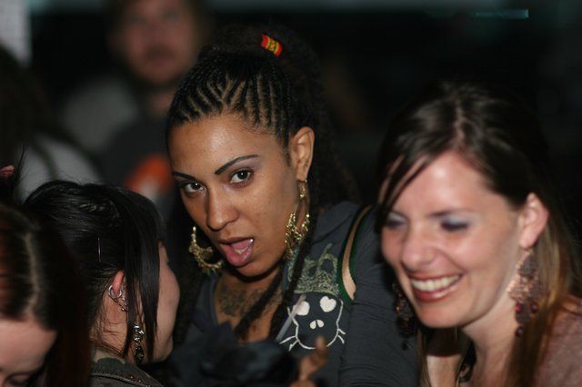Friends Sharing a Moment at Nightclub Party