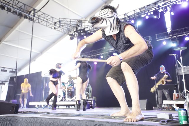 Zebra-masked Drummer Takes Center Stage