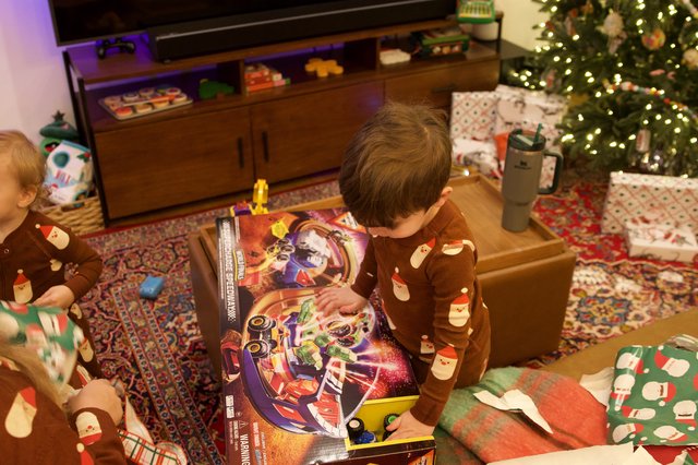 Christmas Morning Joy: Children Opening Presents